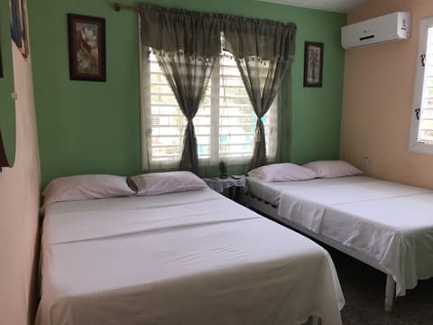 Standard Triple Room, Multiple Beds, Non Smoking | Iron/ironing board, bed sheets