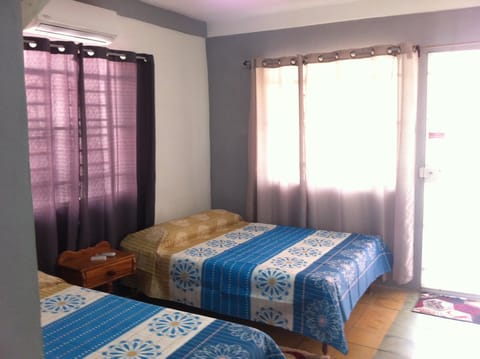 Standard Triple Room, Multiple Beds, Non Smoking | Free WiFi, bed sheets