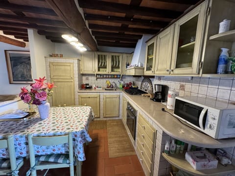 Cabinetry, Furniture, Table, Countertop, Gas Stove, Kitchen Stove, Building, Kitchen, Kitchen Appliance, Interior Design