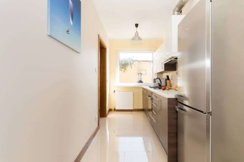 A kitchen that provides a comfortable space for communal meals. 