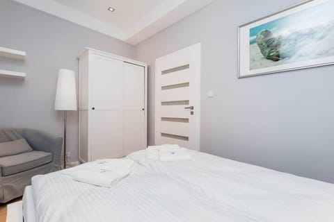 Comfortable double bed in the bedroom. 