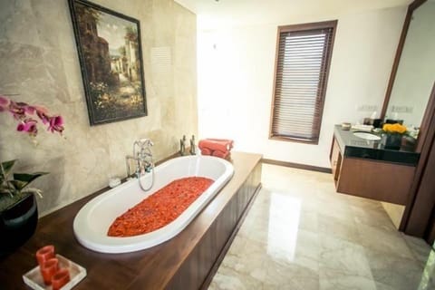 Suite, Non Smoking, Ocean View | Bathroom | Combined shower/tub, deep soaking tub, free toiletries, slippers