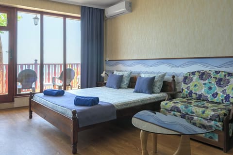Quadruple Room, Balcony | Select Comfort beds, in-room safe, desk, soundproofing