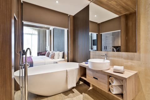 Ultra Luxury Duplex Suite | Bathroom | Designer toiletries, hair dryer, towels, soap