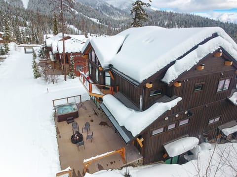 Ariel view of the On Home Again ski run next to the hot tub and fire pit.