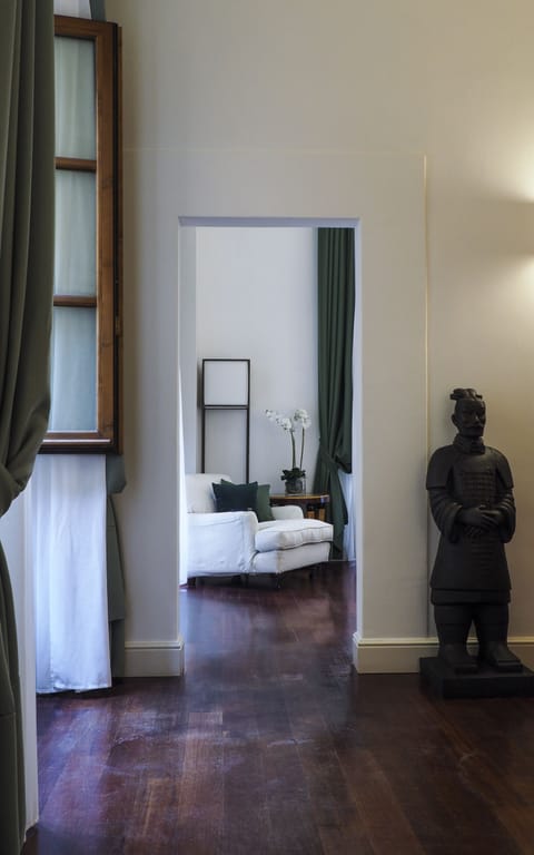 Deluxe Room | Minibar, in-room safe, iron/ironing board, free WiFi