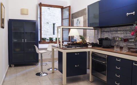 Classic Apartment | Minibar, in-room safe, iron/ironing board, free WiFi