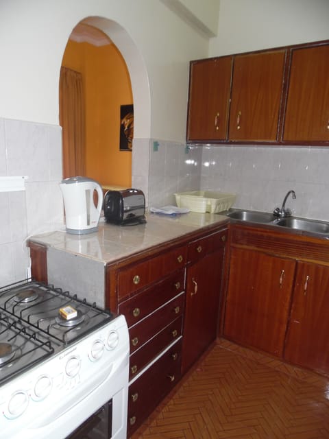 Standard Apartment, 2 Bedrooms | Private kitchenette | Fridge, microwave, oven, stovetop