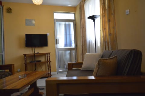 Standard Apartment, 1 Bedroom | Living room | TV