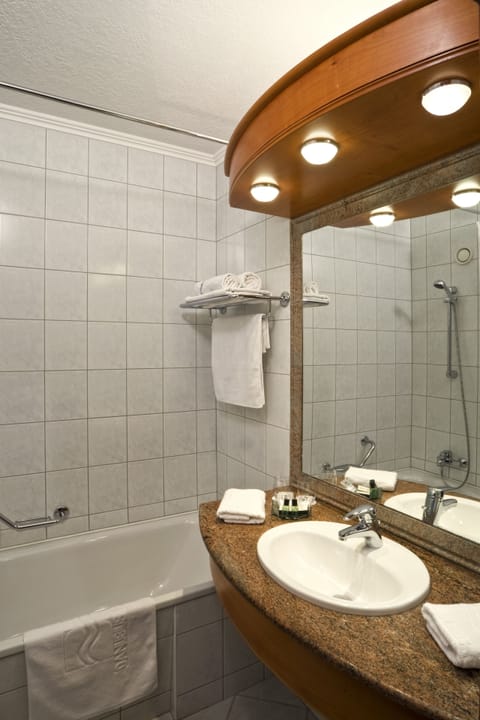 Combined shower/tub, eco-friendly toiletries, hair dryer, bathrobes