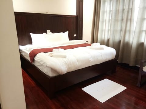 Deluxe Single Room | Blackout drapes, soundproofing, free WiFi, bed sheets