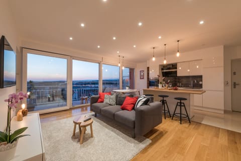 Panoramic Apartment, 2 Bedrooms, Sea View | Living area | 42-inch flat-screen TV with cable channels, TV