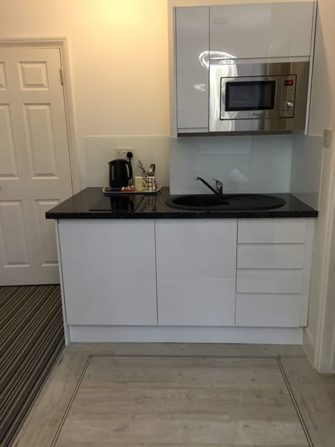 Standard Studio, Non Smoking | Private kitchenette | Fridge, microwave, stovetop, highchair