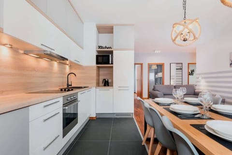 The kitchenette creates the perfect space for cooking home-cooked meals.