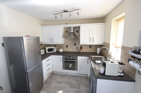 Fully equipped kitchen with oven fridge/freezer  washer/drier kettle toaster etc