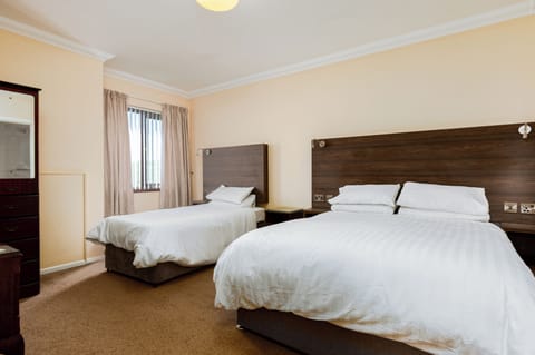 Family Room, Multiple Beds, Non Smoking | Desk, blackout drapes, iron/ironing board, free WiFi