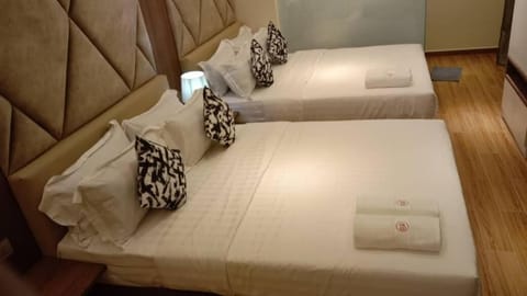 Family Room, 2 Double Beds, Non Smoking | Free WiFi, bed sheets