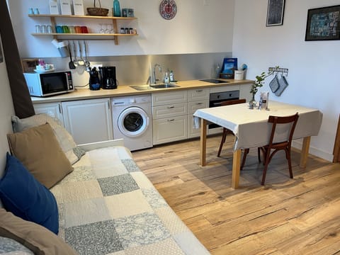 Comfort Apartment, Multiple Beds, Patio | Living area | 40-inch flat-screen TV with satellite channels