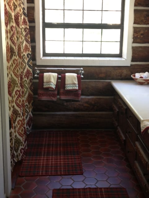 1st floor full bathroom: tub/shower combination.  Large vanity, sink, laundry.