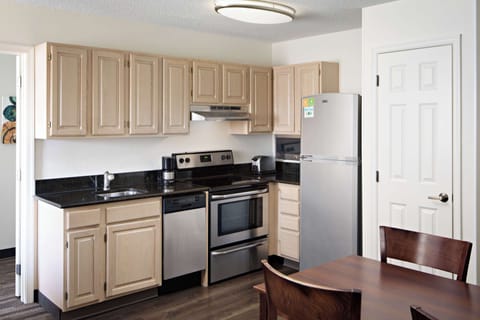 Suite, 2 Bedrooms | Private kitchen | Fridge, microwave, coffee/tea maker, cookware/dishes/utensils