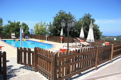 Seasonal outdoor pool, pool umbrellas, sun loungers