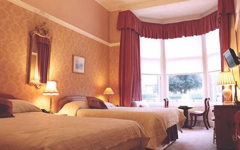 Family Room | Select Comfort beds, iron/ironing board, free WiFi, bed sheets