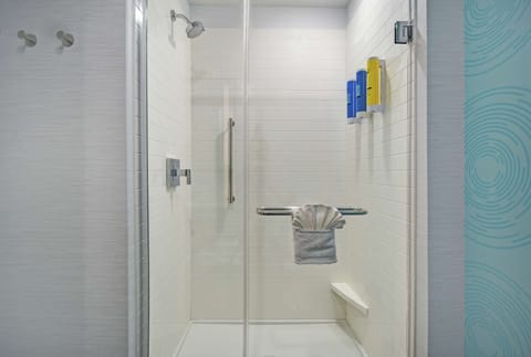 Shower, designer toiletries, towels