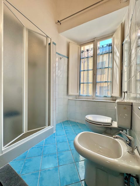 Triple Room, Private Bathroom (External) | Bathroom | Shower, free toiletries, hair dryer, bidet