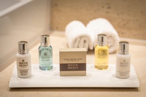 Suite, Sea View | Bathroom amenities | Designer toiletries, hair dryer, bathrobes, slippers