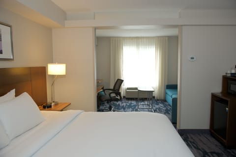 Suite, 1 King Bed with Sofa bed | In-room safe, iron/ironing board, free cribs/infant beds, free WiFi