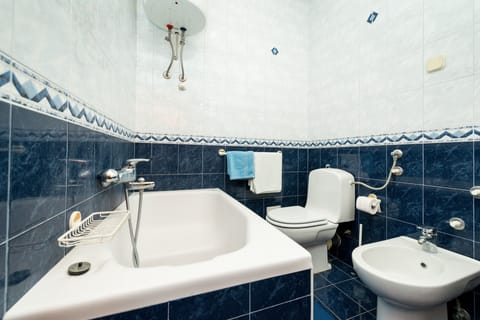 Comfort Double Room, Terrace, Partial Sea View | Bathroom | Deep soaking tub, free toiletries, hair dryer, towels