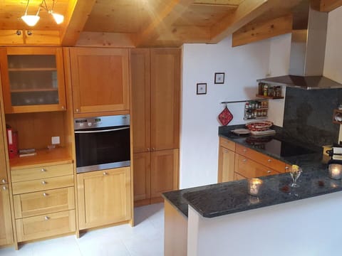 Cabinetry, Furniture, Property, Countertop, Wood, Interior Design, Drawer, Gas Stove, Home Appliance, Kitchen Appliance