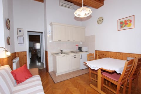 Apartment, 1 Bedroom, Balcony | Private kitchen | Fridge, stovetop, electric kettle, cookware/dishes/utensils