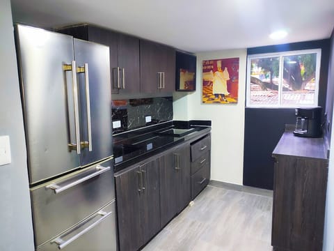 Exclusive Suite, 1 Bedroom, Jetted Tub | Shared kitchen | Fridge, microwave, toaster, rice cooker