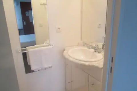 Shower, eco-friendly toiletries, hair dryer, towels