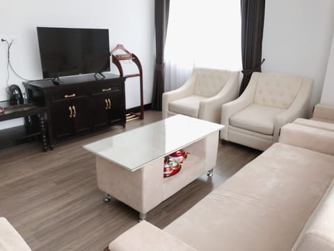 Suite with Balcony  | Living room | Flat-screen TV