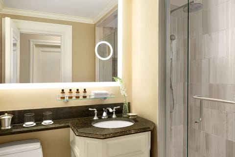 Combined shower/tub, designer toiletries, hair dryer, bathrobes