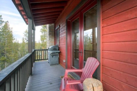 Main level deck provides seating and a gas grill