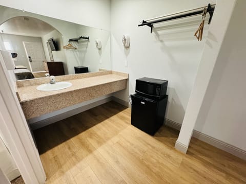 Room, 2 Queen Beds, Non Smoking | Bathroom | Combined shower/tub, towels, soap, shampoo