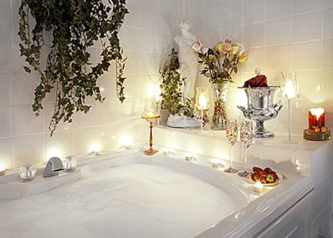 Renoir luxury suite | Bathroom | Designer toiletries, hair dryer, bathrobes, towels