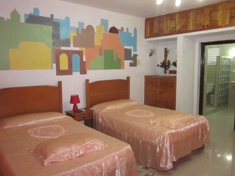 Deluxe Apartment, 2 Queen Beds, Non Smoking, City View | 1 bedroom, in-room safe, individually decorated, individually furnished