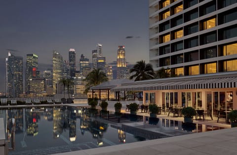 Outdoor pool, pool umbrellas, sun loungers