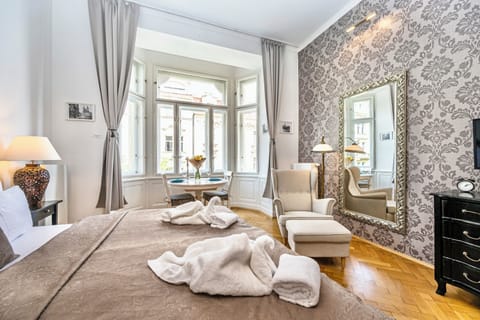 Romantic Apartment, Kitchenette (Old Town square view, dining area) | Select Comfort beds, minibar, in-room safe, individually decorated