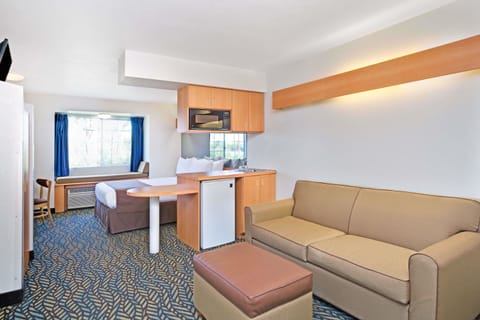 Studio Suite, 1 Queen Bed, Non Smoking | Desk, blackout drapes, free cribs/infant beds, rollaway beds