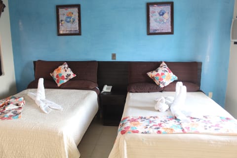 Family Room, 2 Queen Beds, Non Smoking | In-room safe, iron/ironing board, bed sheets