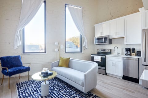 Classic Apartment, 1 Bedroom | Living area | Flat-screen TV