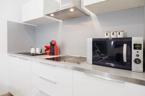 City Studio | Private kitchen | Fridge, microwave, stovetop, dishwasher