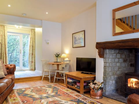 Open plan living space with wood burner | Monkey Cottage, Grassington