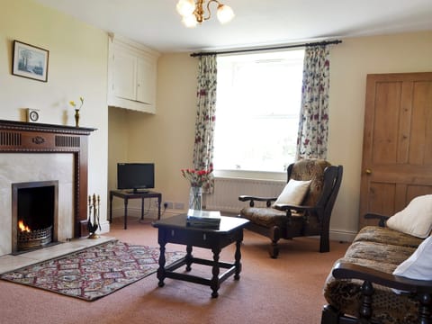 Traditional and warm living room | East Bridge End Farm, Frosterley, near Stanhope
