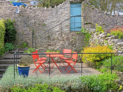 Private terraced garden with table and chairs | Beech Hill, Kendal